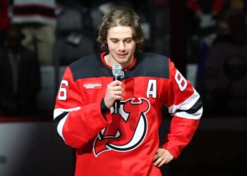 Jack Hughes #86 of the New Jersey Devils addresses the crowd as The New Jersey Devils honor Hughes after winning a gold medal in the Olympics during a pregame ceremony when the New Jersey Devils played the Buffalo Sabres Wednesday, February 25, 2026 at Prudential Center in Newark, NJ.