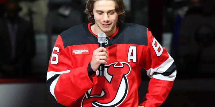 Jack Hughes #86 of the New Jersey Devils addresses the crowd as The New Jersey Devils honor Hughes after winning a gold medal in the Olympics during a pregame ceremony when the New Jersey Devils played the Buffalo Sabres Wednesday, February 25, 2026 at Prudential Center in Newark, NJ.