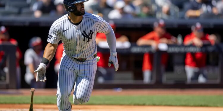 New York Yankees outfielder Jasson Domínguez (24) on the field at Yankee Stadium after hitting a ground-rule double.