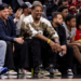 New Orleans Saints defensive end Cam Jordan watching a basketball game.
