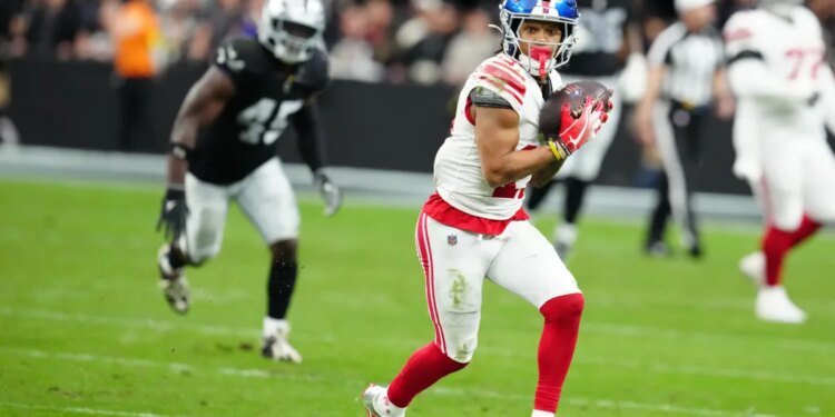 New York Giants wide receiver Wan'Dale Robinson (17) runs with the ball after a catch against the Las Vegas Raiders.
