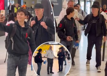 John McEnroe has ugly confrontation with fan at airport after Australian Open
