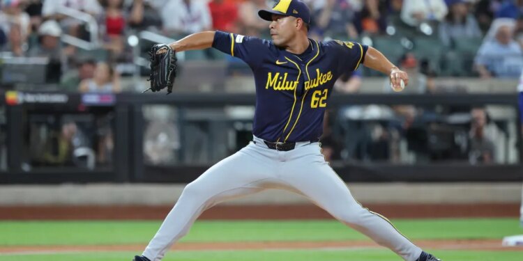 Jose Quintana #62 of the Milwaukee Brewers throws a pitch
