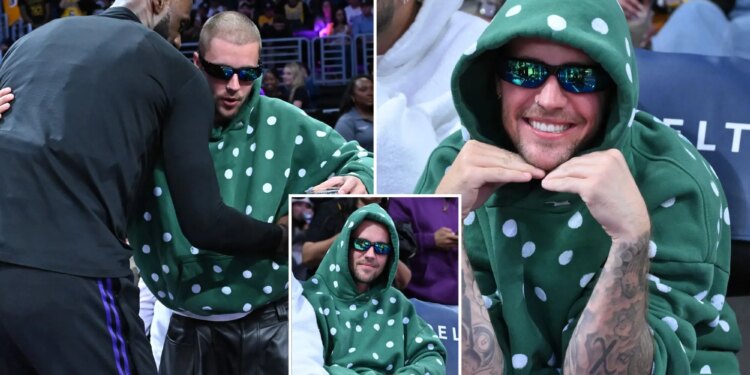 Justin Bieber cheers LeBron James courtside at Lakers game