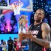 Miami forward Keshad Johnson holds Slam Dunk Contest trophy