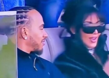 Kim Kardashian and Lewis Hamilton sitting together at Super Bowl 2026 at Levi's Stadium in Santa Clara, Calif. on February 8, 2026.