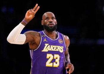 LeBron James gestures after scoring a point.