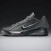 LeBron NXXT Gen by JuJu Watkins basketball shoe in dark gray with a reflective silver Nike swoosh.