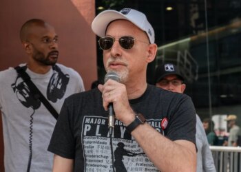Deputy Executive Director at Major League Baseball Players Association Bruce Meyer speaks as striking members of Writers Guild of America picketing in front of CBS Broadcast Center on theme Sport Writers Picket. Executives from NHL Players Association, NFL Players Association, MLB Players Association joined and spoke during picket.