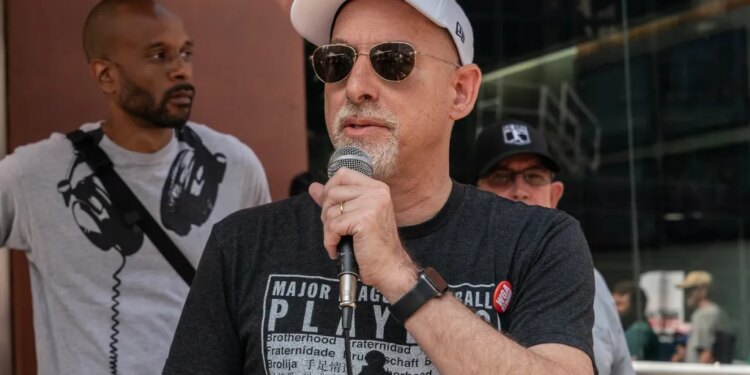 Deputy Executive Director at Major League Baseball Players Association Bruce Meyer speaks as striking members of Writers Guild of America picketing in front of CBS Broadcast Center on theme Sport Writers Picket. Executives from NHL Players Association, NFL Players Association, MLB Players Association joined and spoke during picket.