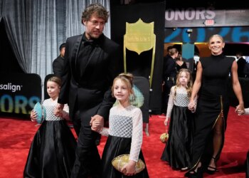 Matthew and Kelly Stafford on red carpet at NFL Honors