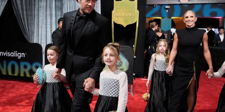 Matthew and Kelly Stafford on red carpet at NFL Honors