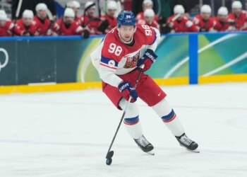 Czechia's Martin Necas is in action during a preliminary round match of men's ice hockey between Switzerland and Czechia at the 2026 Winter Olympics, in Milan, Italy, Sunday, Feb. 15, 2026. (AP Photo/Petr David Josek)