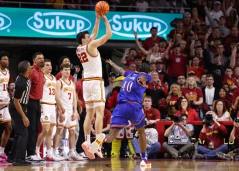 Iowa State Cyclones forward Milan Momcilovic (22) shoots over Kansas Jayhawks forward Flory Bidunga (40).