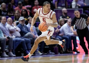 Arkansas Razorbacks guard Darius Acuff Jr. dribbles the basketball during the second half against the LSU Tigers.