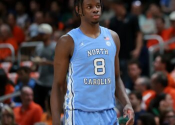 North Carolina Tar Heels forward Caleb Wilson (8) looks on against the Miami Hurricanes during the first half at Watsco Center.