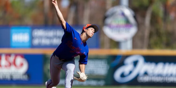 New York Mets pitcher Jonah Tong throws batting practice during Spring Training.