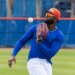 New York Mets’ Luis Robert Jr. fielding a baseball during Spring Training.