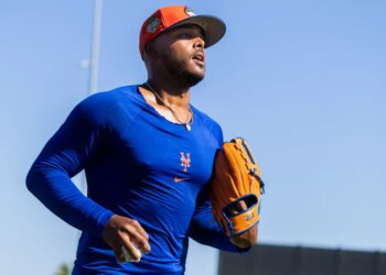 New York Mets Pitcher Freddy Peralta jogging during spring training.