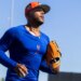 New York Mets Pitcher Freddy Peralta jogging during spring training.