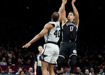 Brooklyn Nets Michael Porter Jr. shooting over San Antonio Spurs Harrison Barnes.