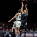 Brooklyn Nets Michael Porter Jr. shooting over San Antonio Spurs Harrison Barnes.