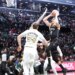 Michael Porter Jr. of the Brooklyn Nets shoots the ball in a basketball game against the Boston Celtics.