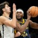 Indiana's Jarace Walker, who scored a game-high 23 points, looks to make a move on Ben Saraf during the Nets' 115-110 loss to the Pacers on Feb. 11, 2026 at Barclays Center.