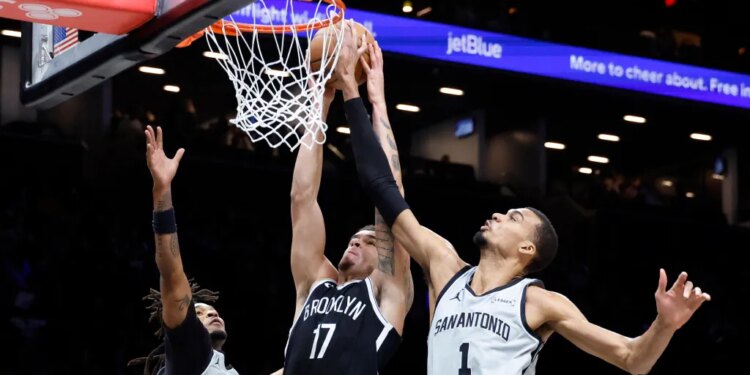 Michael Porter Jr.'s dunk is blocked by Victor Wembanyama during the Nets' 126-110 blowout win over the Spurs on Feb. 26, 2026 at Barclays Center.