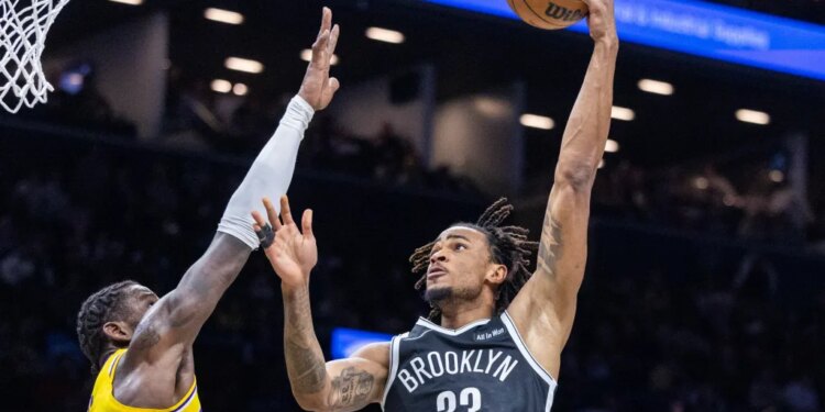 Nic Claxton shoots a hook shot during the Nets' blowout loss to the Lakers on Feb. 3, 2026 at Barclays Center.
