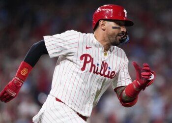 Philadelphia Phillies' Nick Castellanos runs after hitting a double.