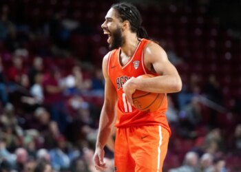 Bowling Green guard Javon Ruffin smiling after a foul was called on UMass.