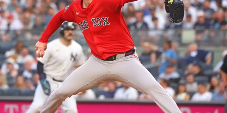 Boston Red Sox pitcher Walker Buehler throws a pitch.