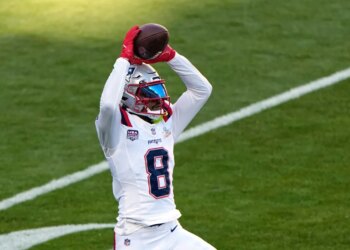 New England Patriots wide receiver Stefon Diggs warms up before the NFL Super Bowl 60 football game against the Seattle Seahawks, Sunday, Feb. 8, 2026, in Santa Clara, Calif.