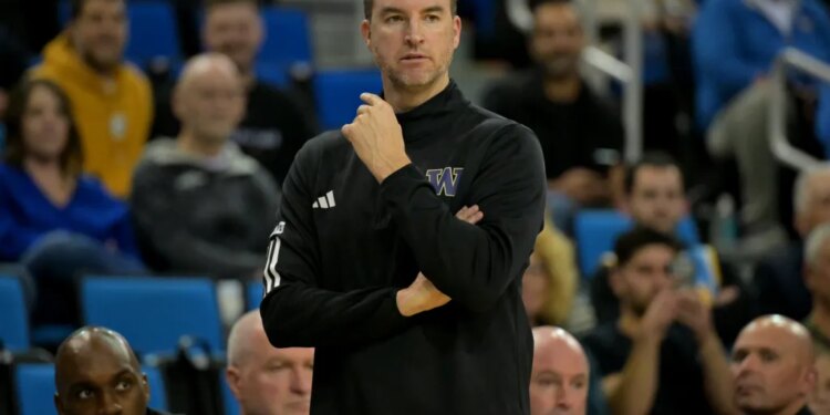 Washington men's basketball coach Mike Hopkins on the sideline.