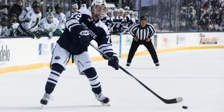 Penn State Nittany Lions forward Gavin McKenna (72) looks to shoot the puck during the first period against the Michigan State Spartans at Beaver Stadium.