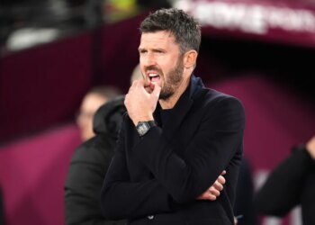 Manchester United manager Michael Carrick watches a Premier League match.