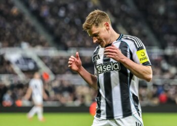 Harvey Barnes of Newcastle United reacting during a UEFA Champions League match.
