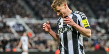 Harvey Barnes of Newcastle United reacting during a UEFA Champions League match.
