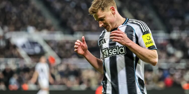 Harvey Barnes of Newcastle United reacting during a UEFA Champions League match.