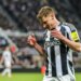 Harvey Barnes of Newcastle United reacting during a UEFA Champions League match.