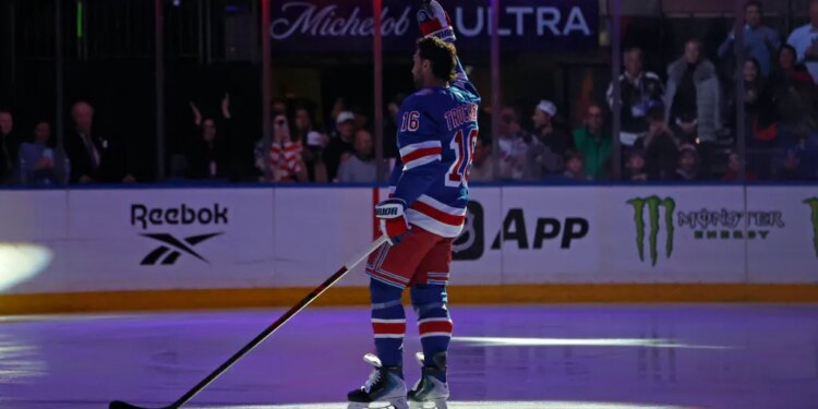 New York Rangers center Vincent Trocheck (16) is greeted by the fans as the New York Rangers honor him along with New York Rangers center J.T. Miller (8) and New York Rangers head coach Mike Sullivan after winning Olympic gold with Team USA in a pre game ceremony when the New York Rangers played the Philadelphia Flyers Thursday, February 26, 2026 at Madison Square Garden on Feb, 26, 2026.