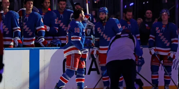 New York Rangers center Vincent Trocheck (16) is greeted by the fans as the New York Rangers honor him along with New York Rangers center J.T. Miller (8) and New York Rangers head coach Mike Sullivan after winning Olympic gold with Team USA in a pre game ceremony when the New York Rangers played the Philadelphia Flyers Thursday, February 26, 2026 at Madison Square Garden in Manhattan, NY.