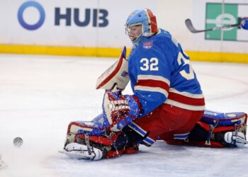 New York Rangers goaltender Jonathan Quick (32) deflecting the puck during a game against the Carolina Hurricanes.