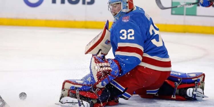 New York Rangers goaltender Jonathan Quick (32) deflecting the puck during a game against the Carolina Hurricanes.