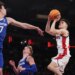 St. John's guard Dylan Darling shoots over Creighton forward Kerem Konan (17) during the second half of an NCAA college basketball game.