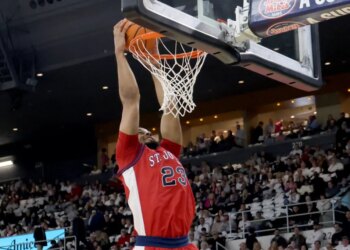 St. John's forward Bryce Hopkins (23) dunks the ball.