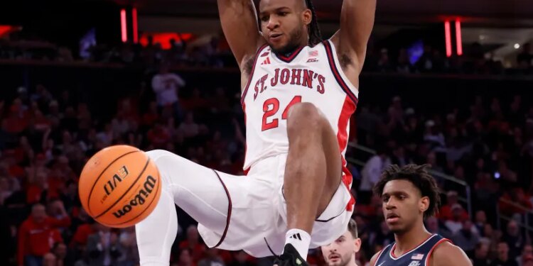 St. John's Red Storm forward Zuby Ejiofor (24) slams the ball during the second half when the St. John's Red Storm played the UConn Huskies Friday, February 6, 2026 at Madison Square Garden in Manhattan, NY.