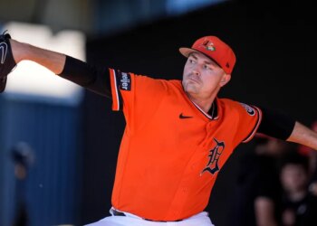 Detroit Tigers pitcher Tarik Skubal (29) throws during spring training.