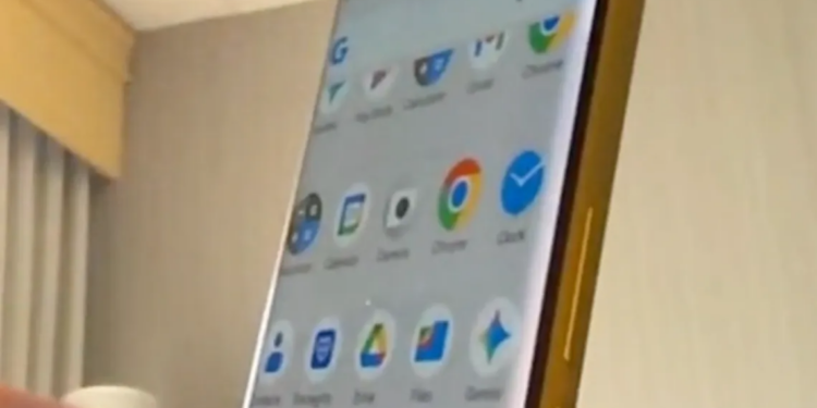 Image of Trump phone on a web call, showing its angled body